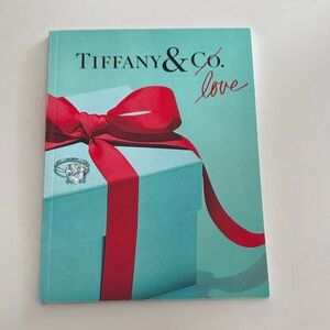 Tiffany & Co. booklet in signature blue with red ribbon